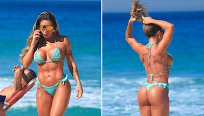 Tati Minerato bronzeia corpo definido em praia carioca; fotos