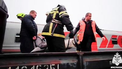 2 dead, 1 missing and dozens injured in northern Russia after a passenger train derailment