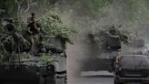 Russian forces cut off last routes out of eastern Ukraine city