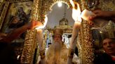 Holy Fire lights up Jerusalem's Holy Sepulchre