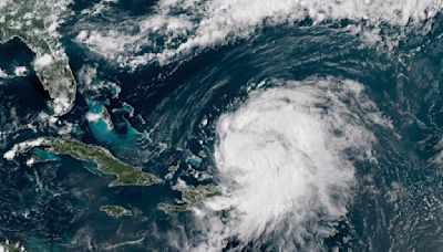 Ernesto grows into Cat 2 hurricane as it aims for Bermuda, leaving many in Puerto Rico without power