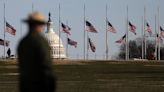 Why are American flags flying at half-staff in Wisconsin on Dec. 7?