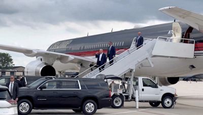 Trump arrives in Milwaukee after assassination attempt as FBI races to establish shooter’s motive: Live