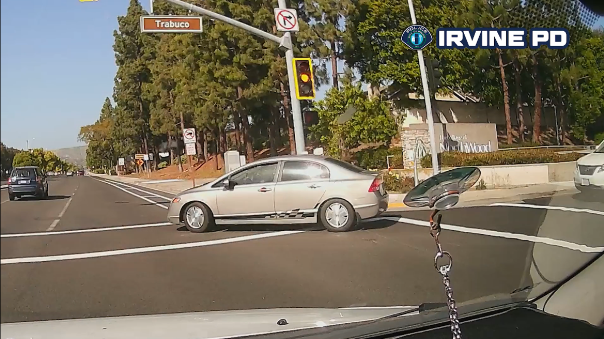 Irvine police look for hit-and-run driver behind rollover crash