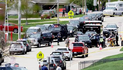 Police shot and killed armed student outside Wisconsin school, authorities say