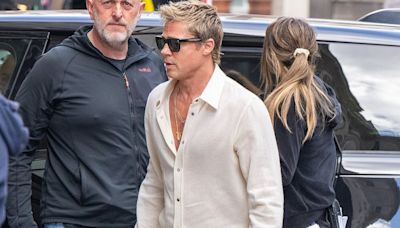 Brad Pitt, 60, looks youthful in an ivory outfit on London set