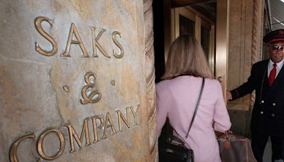 Parent company of Saks Fifth Avenue to buy rival Neiman Marcus