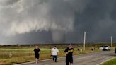 WATCH: Tornado watchers flee funel