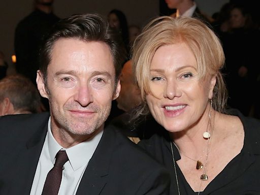 Deborra-Lee Furness glows in white for solo appearance at star-studded Louis Vuitton party