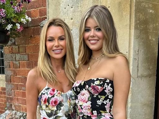Amanda poses with lookalike daughter Lexi on her last day at school