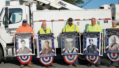 Over 100 military banners placed in Berlin Center