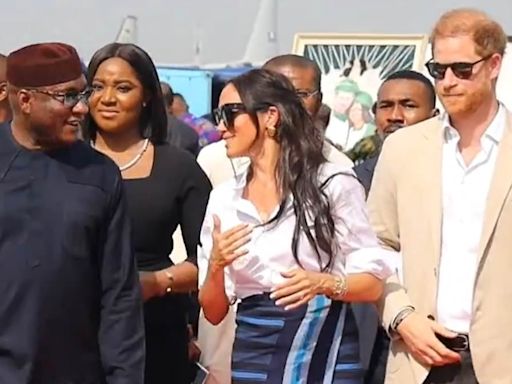 Harry and Meghan were welcomed to Nigeria by fugitive fraudster