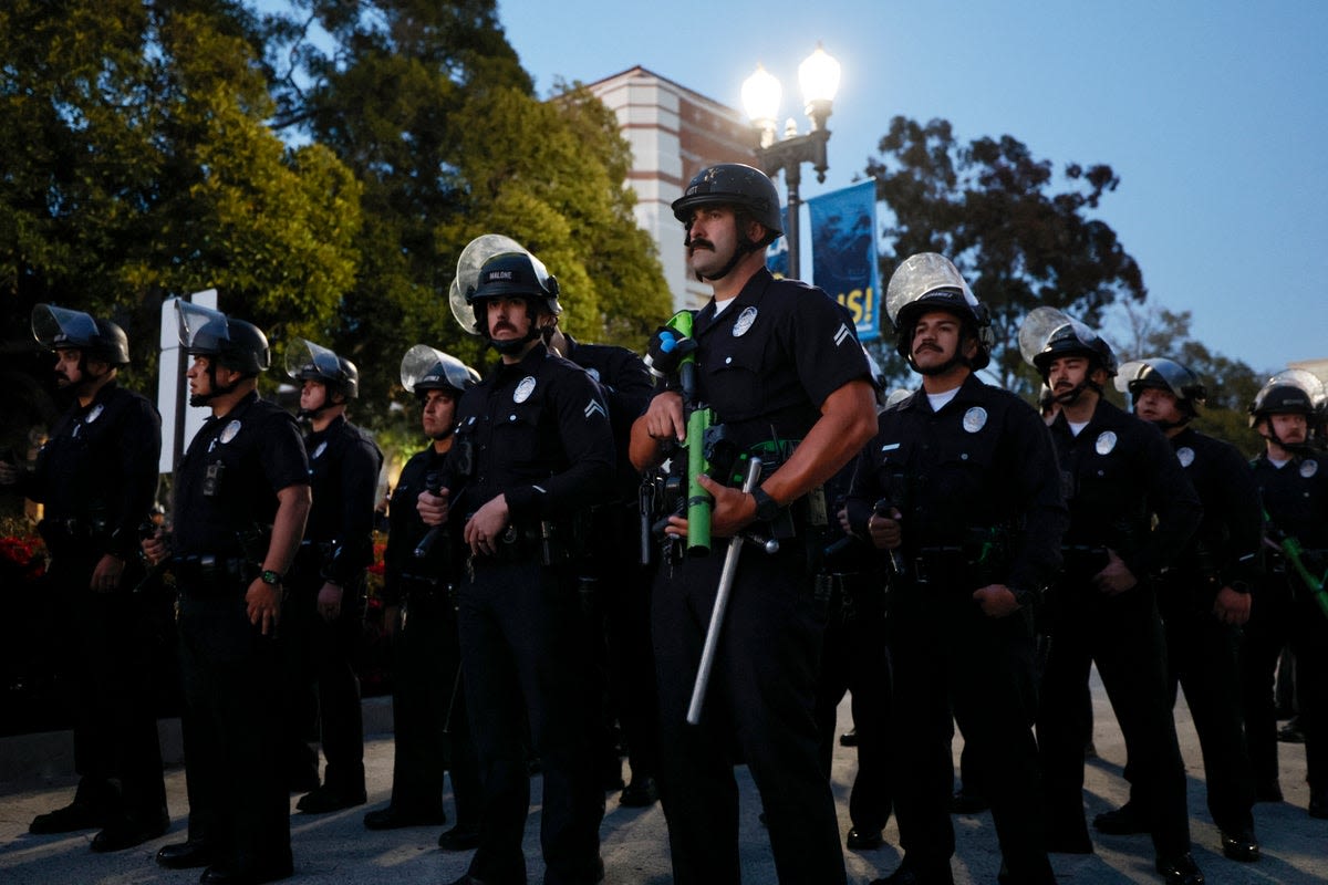 Campus protests live: Police in riot gear mass in UCLA as 300 pro-Palestine protesters arrested in Columbia