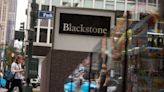 Blackstone Mortgage REIT Cuts Dividend as Distress Increases