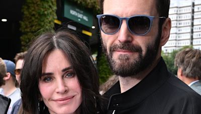 Courteney Cox cosies up to Johnny McDaid at Wimbledon Men's Final