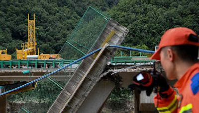 Death toll from bridge collapse in China's Shaanxi province raised to 38. Two dozen still missing