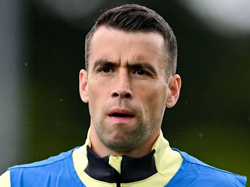 Seamus Coleman reacts to Heimir Hallgrimsson as he makes tournament challenge