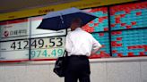 Stock market today: Asian stocks mixed amid volatile yen after Wall St climbs on inflation report