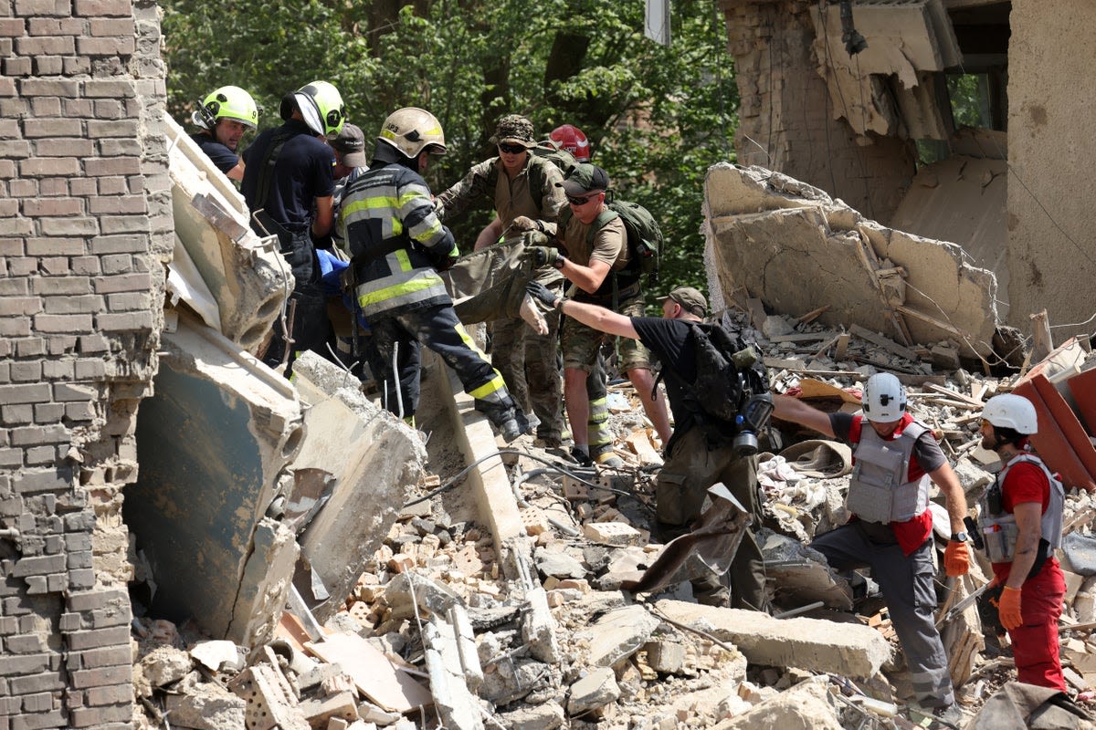 Live view of Kyiv children’s hospital as rescuers search for survivors after Russian missile attack