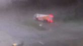 Video: Apparent tornado topples truck on Iowa highway