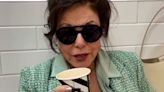Joan Collins enjoys break from shopping as she sips on latte at Marks and Spencer café