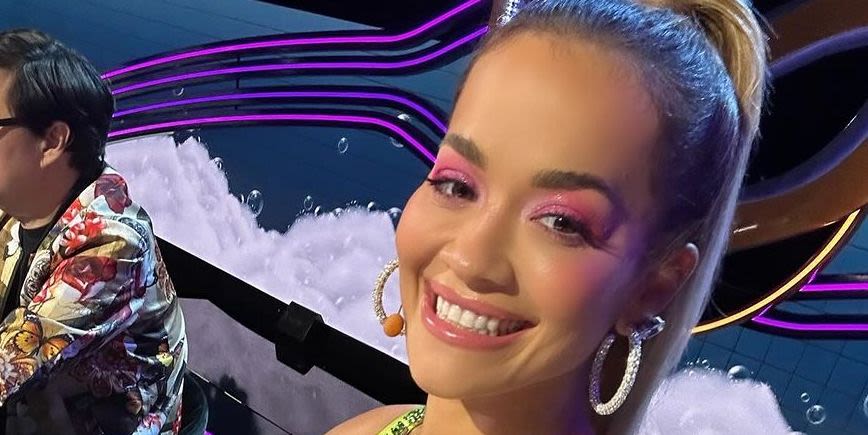 Rita Ora wears ‘60s bridal fit with platform boots that could kill a man