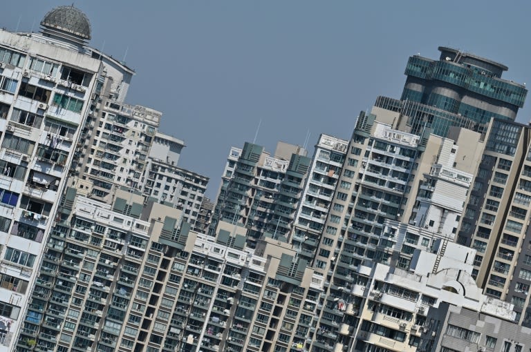 Shanghai lifts home-buying curbs to boost property sector