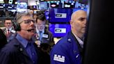 Wall Street stocks close slightly lower; jobs data strong but rates still high