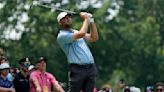 Scottie Scheffler outlasts course intrusion, Tom Kim to win Travelers Championship