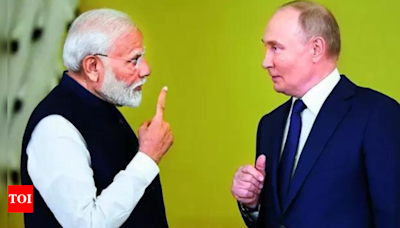 Heart bleeds when innocent kids die in war: PM Modi to Putin | India News - Times of India