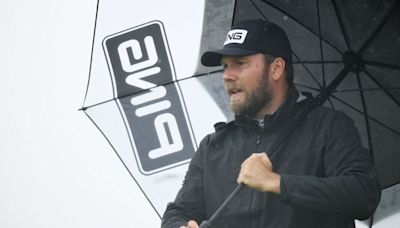 Shane Lowry's playing partner seen smoking cigarette during Open third round