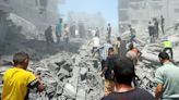 Israeli air strike hits refugee camp and homes in Gaza leaving 38 people dead