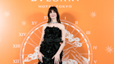 Anne Hathaway revived the black mini dress in stunning Bulgari number with the coolest bow
