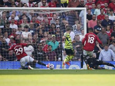 Arsenal beats Man United 1-0 to take title race with Man City to final day of Premier League season