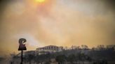 'There was panic': 19,000 evacuate as wildfires rage near hotels in Rhodes, Greece