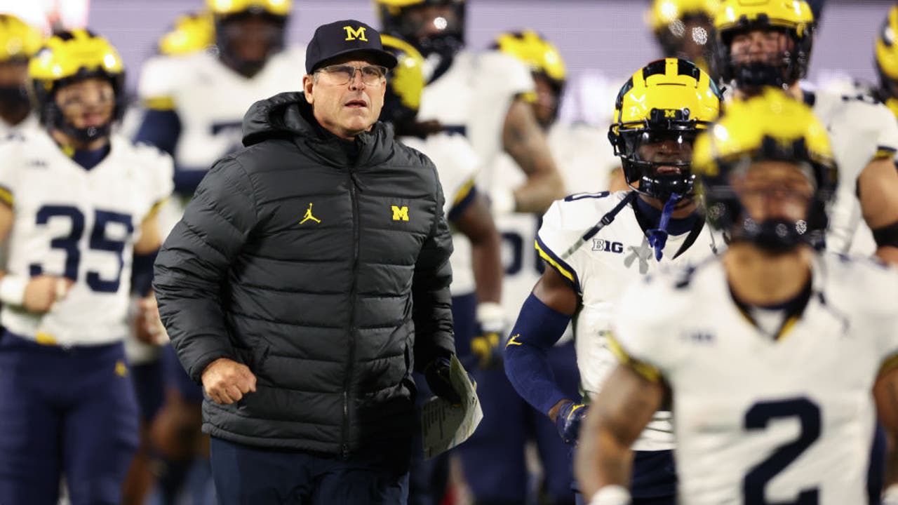 NCAA hands former Michigan coach Jim Harbaugh a 4-year show cause order for recruiting violations