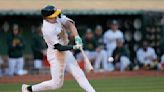 A's beat Royals 7-5 to end 9-game slide