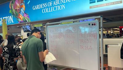 Some airports were forced to use whiteboards to handwrite flight information due to the global IT outage