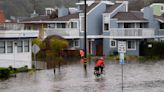 California should buckle up for a ‘parade of cyclones’ as the historic storm battering the state is set to leave tens of thousands without power