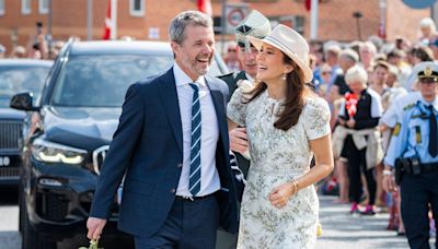 King Frederik and Queen Mary are all giggles as they move for the summer holidays