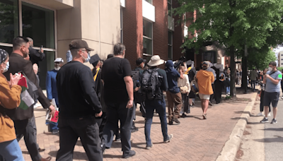 VCU graduates walkout during Gov. Youngkin’s speech at commencement ceremony