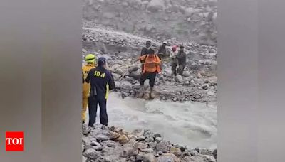 Bridge collapses near Gangotri: SDRF rescues 16 pilgrims, 2 missing | Dehradun News - Times of India