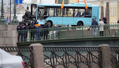 Seven people die after a bus plunges off a bridge in St. Petersburg