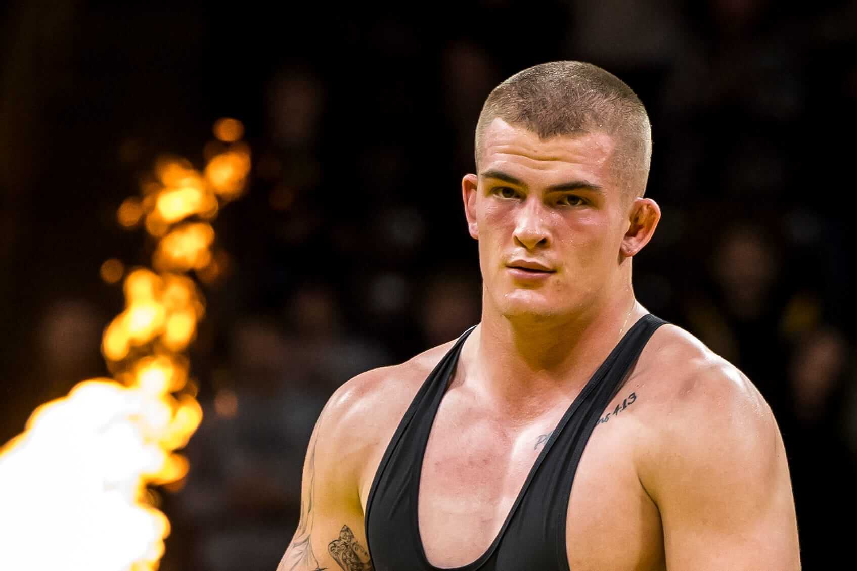 Iowa's Kueter pausing football to focus on wrestling