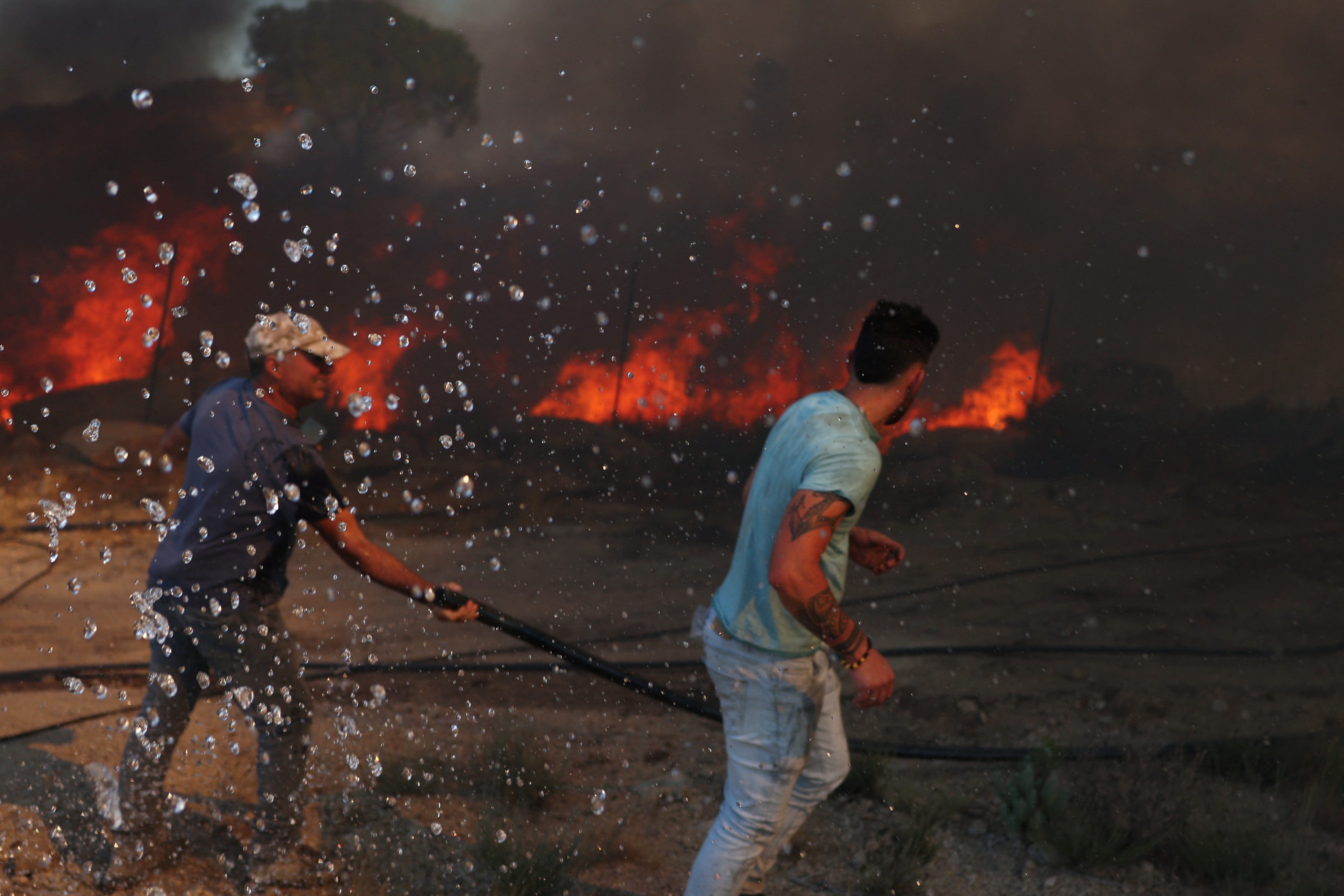 At least two die as wildfires hit Portugal, Europe sends help