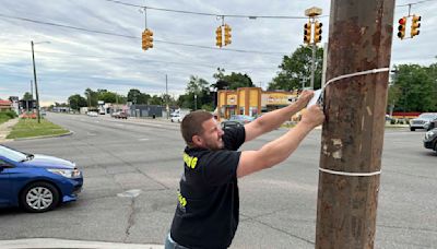 In fight against blight, Detroit cracks down on business owners who illegally post signs