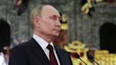 Putin says Russia will develop its nuclear arsenal to preserve global balance of power