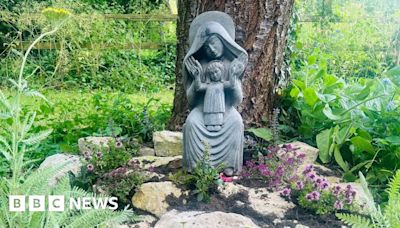 Apology after Glastonbury mother and child statue is moved