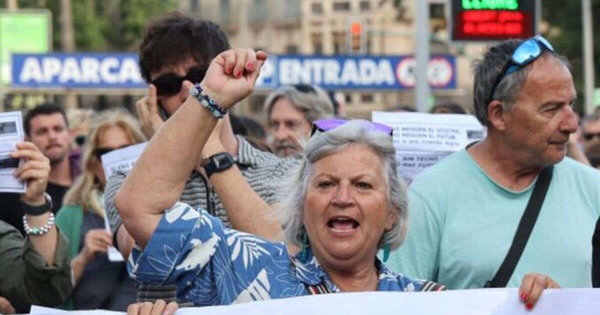 Spanish island protests turn nasty as angry locals vow to 'fight Brits on beach'