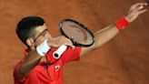 Djokovic needs medical attention after getting knocked on the head by a water bottle at Italian Open - WTOP News
